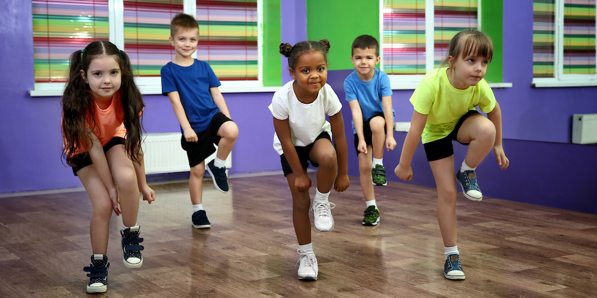 Choreographed dance, colorful classroom